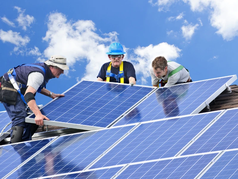 Solar Panel Supplier team installing solar panels on a rooftop solar project